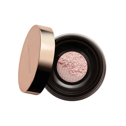 Open cosmetic container with pink powder on a white background