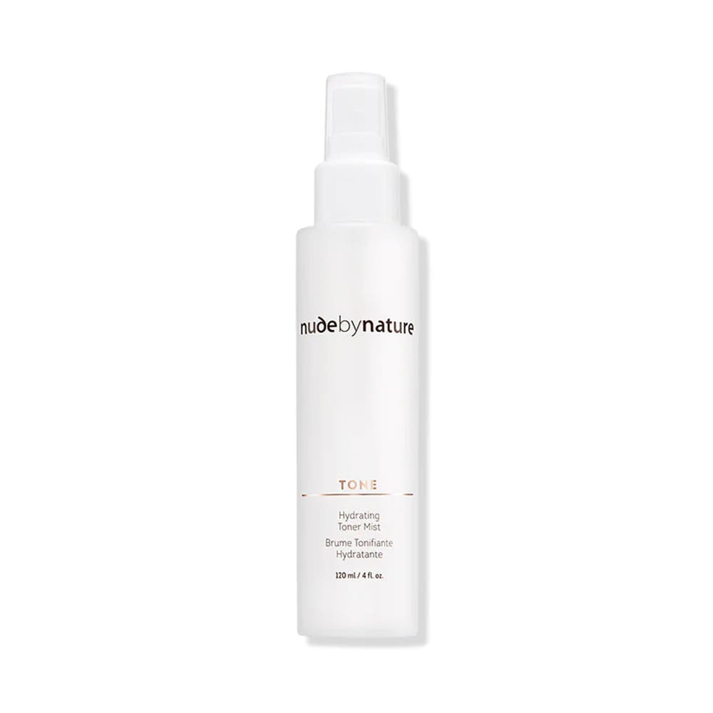 Skincare bottle labeled 'nude by nature' on a white background