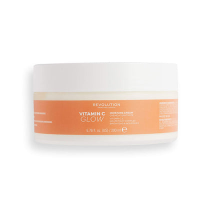 Revolution Vitamin C Glow moisturizing cream jar on a white background