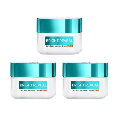 Three jars of Bright Reveal Dark Spot Hydrating Cream on a white background