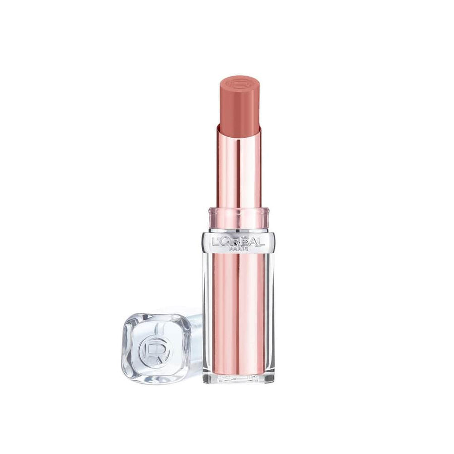 L'Oreal Glow Paradise Lipstick in a shade 'Pastel Exaltation', with the cap removed, displaying the product in a clear tube with a pink tint.