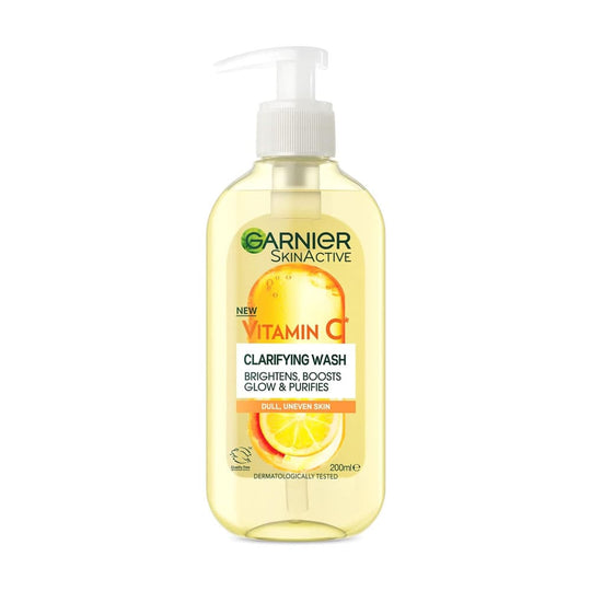 A pump bottle of Garnier Skin Active Vitamin C Clarifying Wash 200ml with product information and branding visible.
