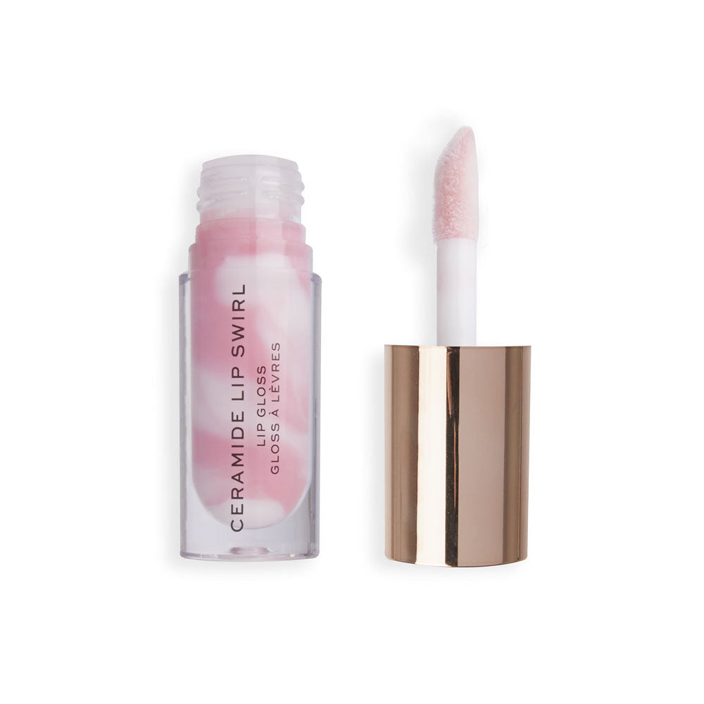 Lip gloss with applicator on a white background