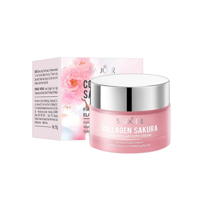 Pink skincare cream jar with silver lid and Sador packaging on a white background
