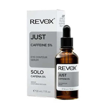 REVOX Just Caffeine 5% Eye Contour Serum in an amber glass dropper bottle next to its white and gray retail box.